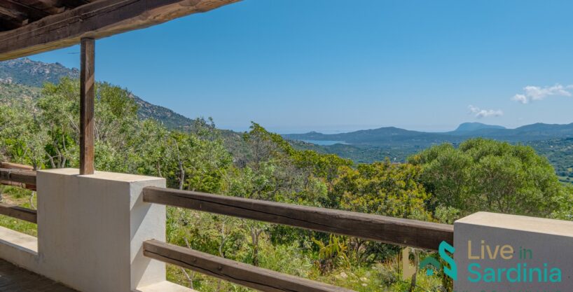 view from a veranda of a sardinia house on the mediterranean vegetation and scenic view on sardinia coastline