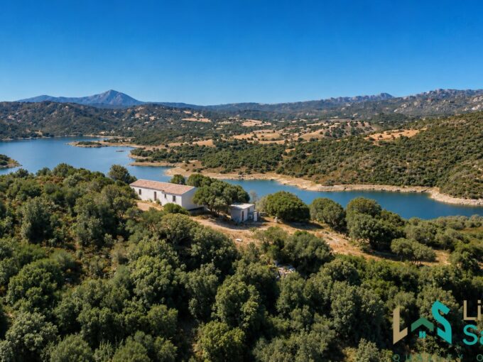 Country house for sale in Sardinia with land and views over Lake Liscia.