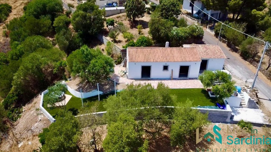 aerial view of restored sardinia stazzu cottage