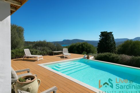 Infinity pool overlooking the Sardinian coastline at luxury villa in Cugnana, Olbia.